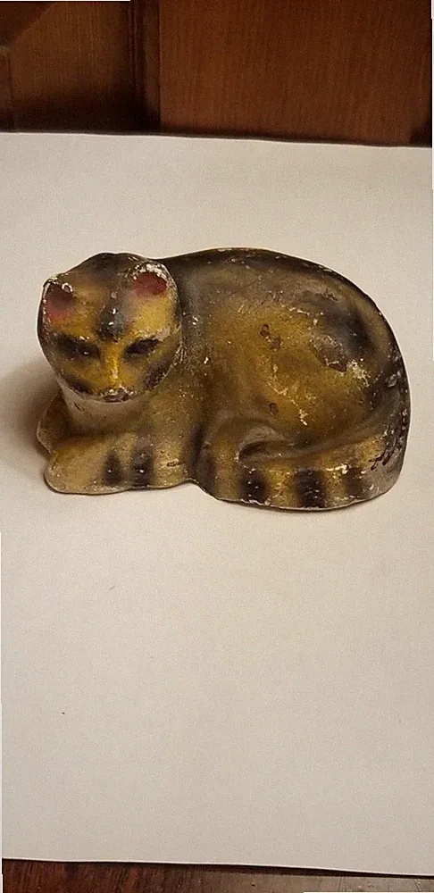 Antique small tabby chalkware cat 19th C. reclining 4" L figure figurine